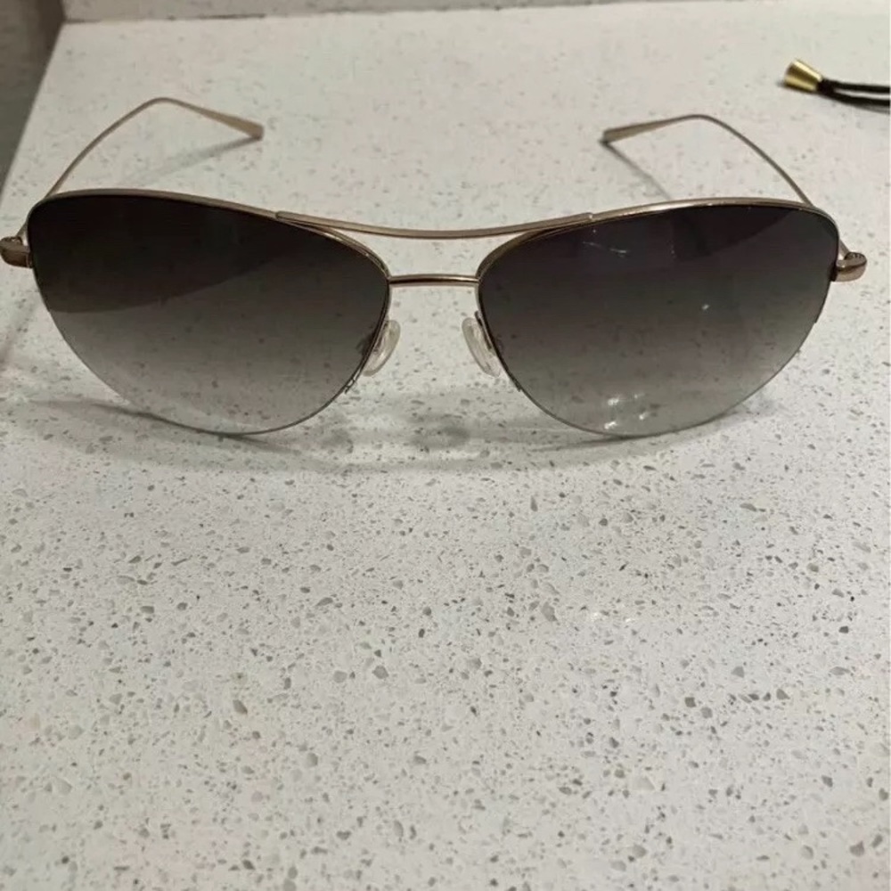 Oliver Peoples Strummer. Gold frames, Olive lenses (seen on Bead Pitt Oceans 13)